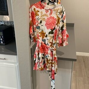 Floral dress, mid sleeves, tie waist.